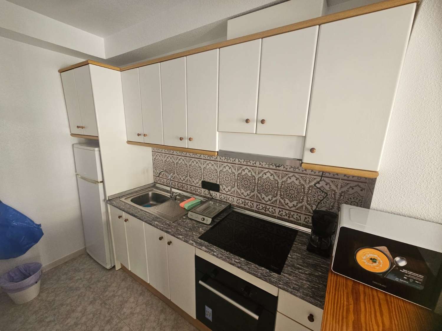 APARTAMENTO EN PLANTA BAJA CON GRAN PATIO PRIVADO, PISCINA Y ALTA RENTABILIDAD EN PLAYA FLAMENCA