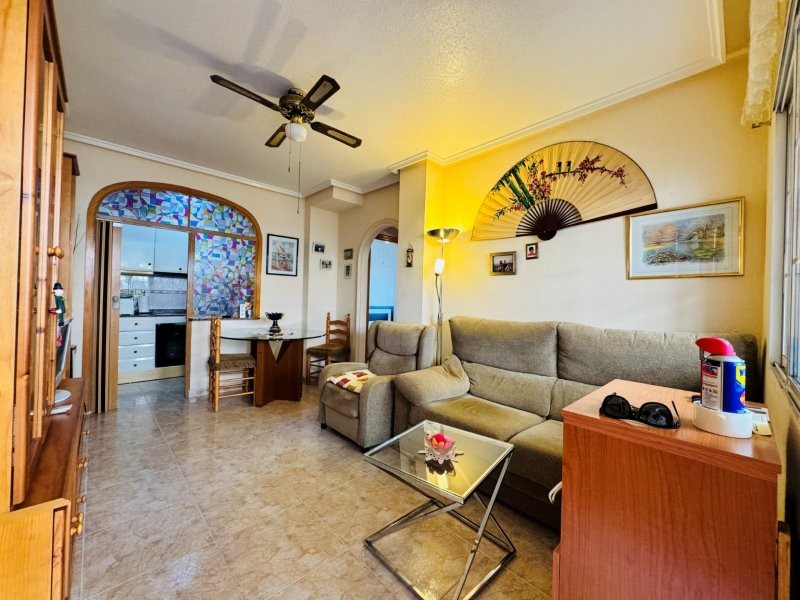 PLANTA BAJA ESQUINA CON 2 DORMITORIOS, GRAN TERRAZA, GARAJE CERRADO Y PISCINA A 300 M DE LA PLAYA