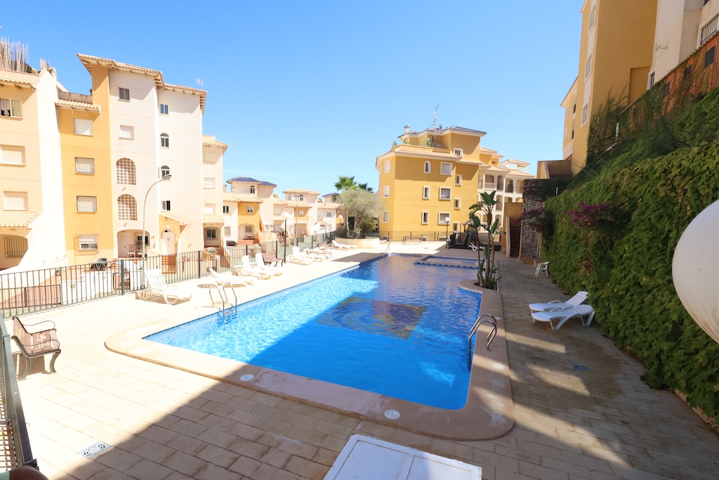 MODERN 2 BEDROOM APARTMENT WITH LARGE TERRACE, POOL AND GARAGE IN CAMPOAMOR