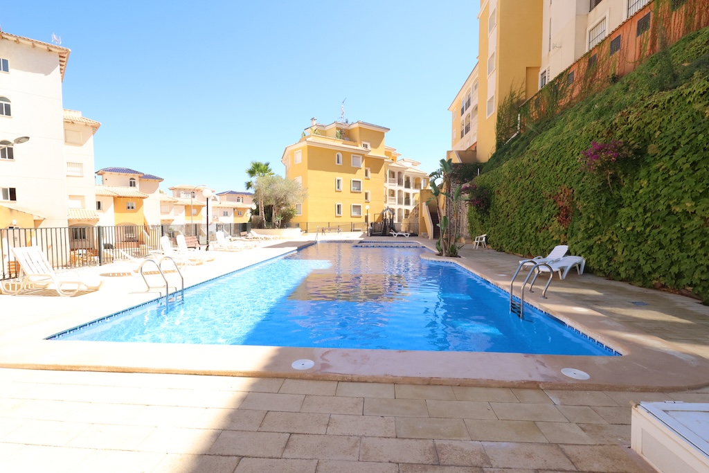 MODERN 2 BEDROOM APARTMENT WITH LARGE TERRACE, POOL AND GARAGE IN CAMPOAMOR