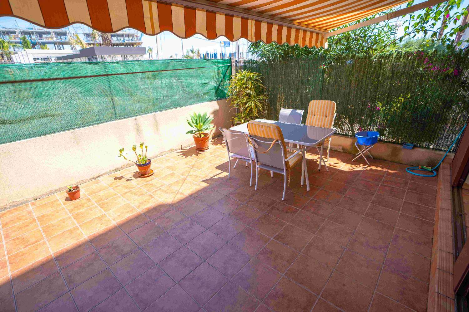 GROUND FLOOR APARTMENT IN RESD. GATED WITH GARAGE SPACE AND STORAGE ROOM IN PLAYA FLAMENCA