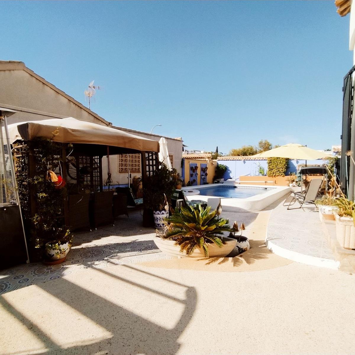 UNIQUE VILLA IN ORIHUELA COSTA WITH PRIVATE POOL, GARDEN AND OUTDOOR KITCHEN