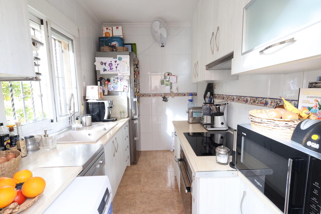 DETACHED VILLA IN PLAYA FLAMENCA WITH PLOT, TERRACES AND COMMUNAL POOL