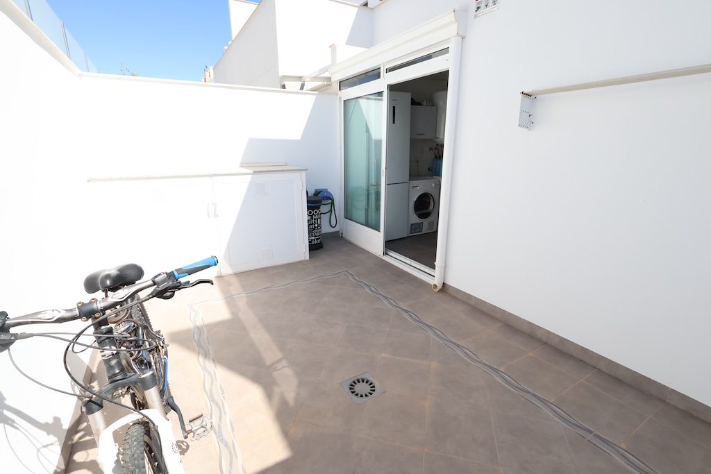 CASA A SCHIERA A TORRE DE LA HORADADA CON SOLARIUM, VISTA SUL MARE E PISCINA COMUNE