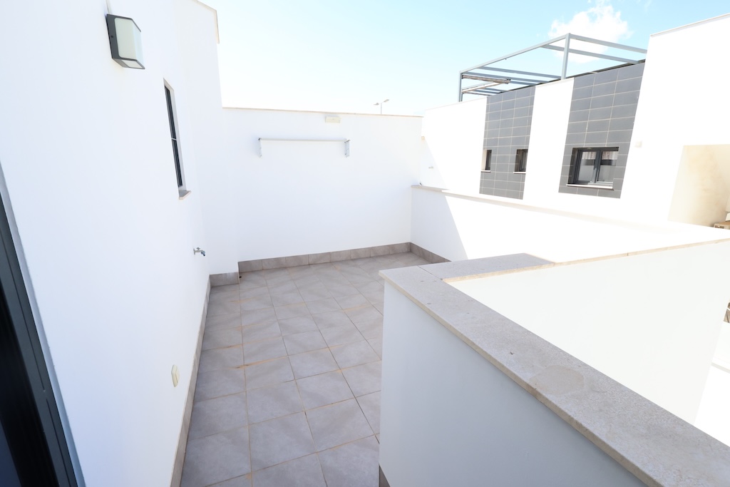CASA A SCHIERA A TORRE DE LA HORADADA CON SOLARIUM, VISTA SUL MARE E PISCINA COMUNE