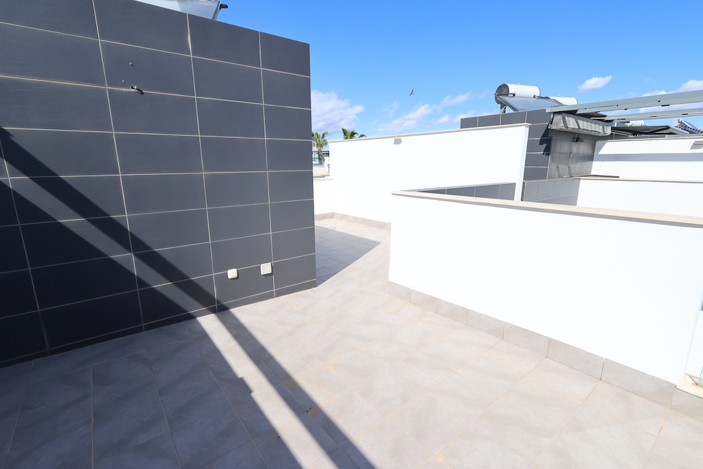 CASA A SCHIERA A TORRE DE LA HORADADA CON SOLARIUM, VISTA SUL MARE E PISCINA COMUNE