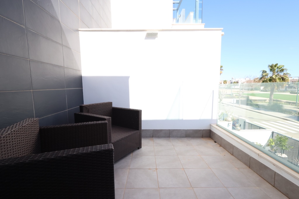 CASA A SCHIERA A TORRE DE LA HORADADA CON SOLARIUM, VISTA SUL MARE E PISCINA COMUNE
