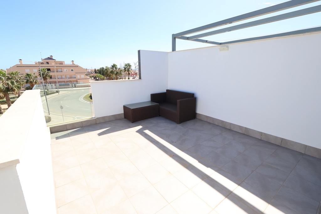 CASA A SCHIERA A TORRE DE LA HORADADA CON SOLARIUM, VISTA SUL MARE E PISCINA COMUNE