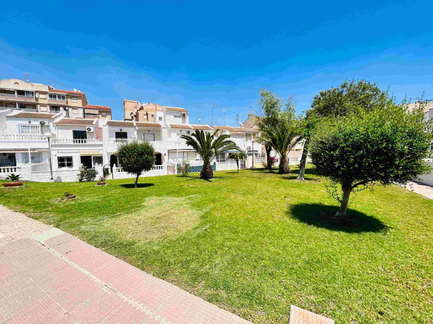 SPECTACULAR CORNER TOWNHOUSE WITH EVERYTHING YOU DREAM OF, STEPS FROM THE SEA