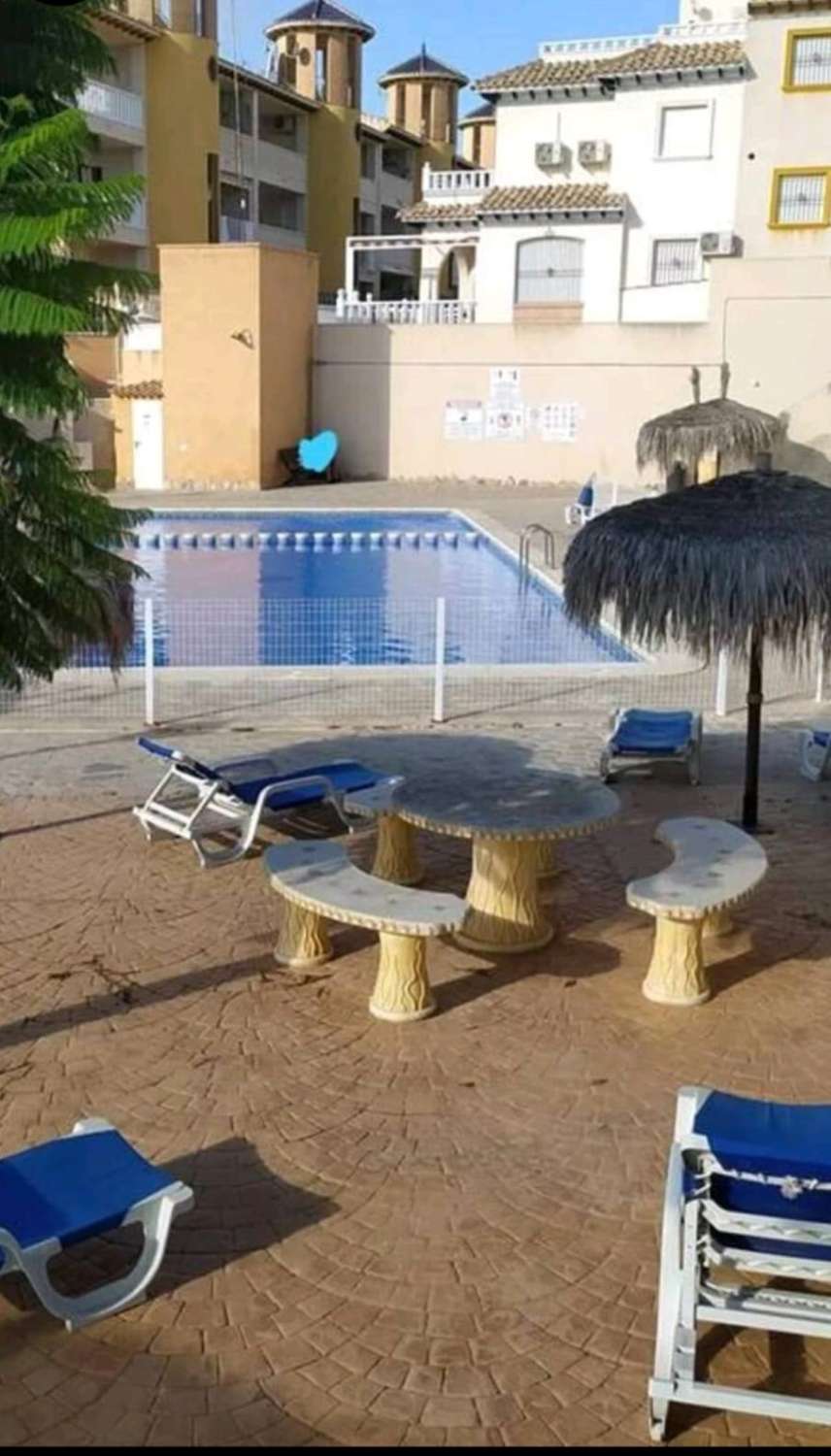 BYT V PŘÍZEMÍ SE ZAHRADOU A BAZÉNEM V LOMAS DE CABO ROIG