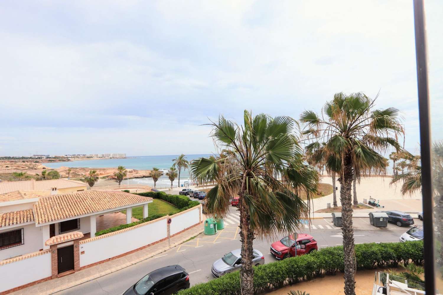1ST LINE SEA APARTMENT MED FANTASTISK UDSIGT OG STOR TERRASSE I PLAYA FLAMENCA
