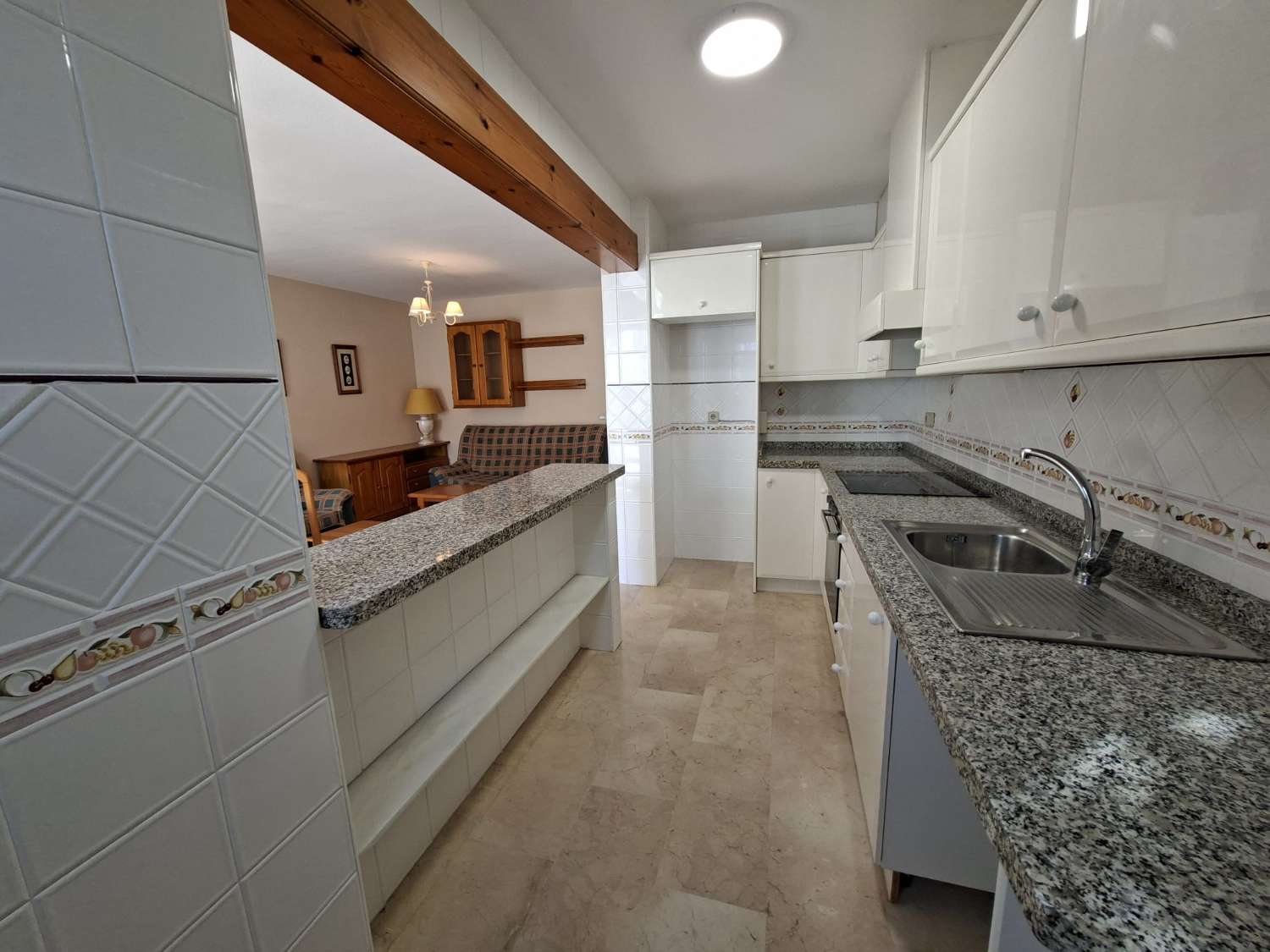 BUNGALOW EN ORIHUELA COSTA CON GRAN SOLÁRIUM PRIVADO Y 2 DORMITORIOS